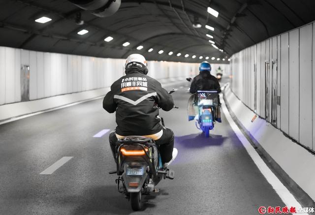 复兴东路隧道新举措：夜间开放电动自行车通行 复兴东路隧道：每晚23时至次日5时电动自行车的新通路