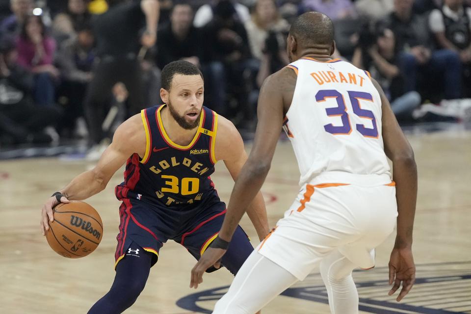 NBA2025：勇士太阳之战背后的全明星故事，2025NBA赛事：库里单核遇挫，布克比尔泄愤之战