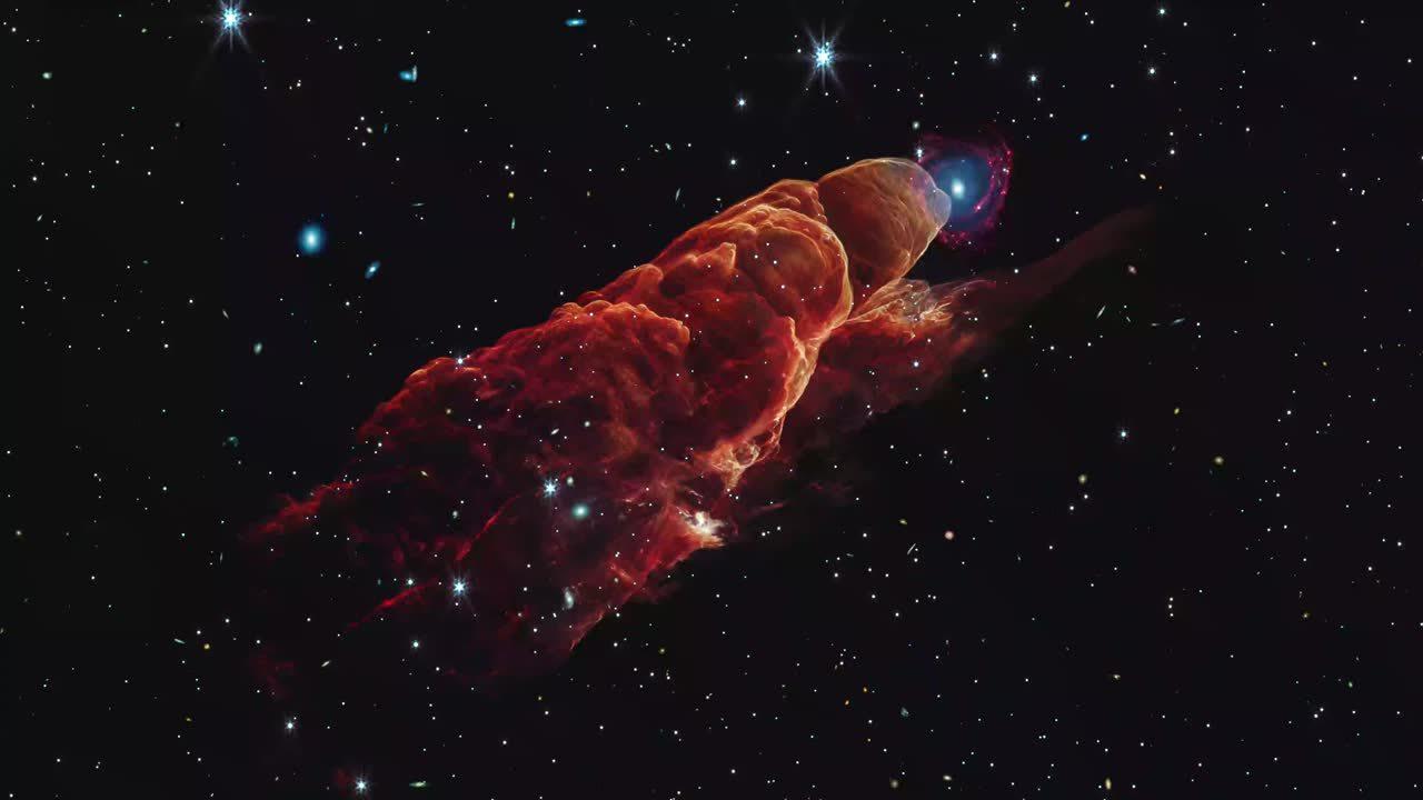 惊！韦伯望远镜捕捉原恒星喷流与遥远星系偶然“同框”